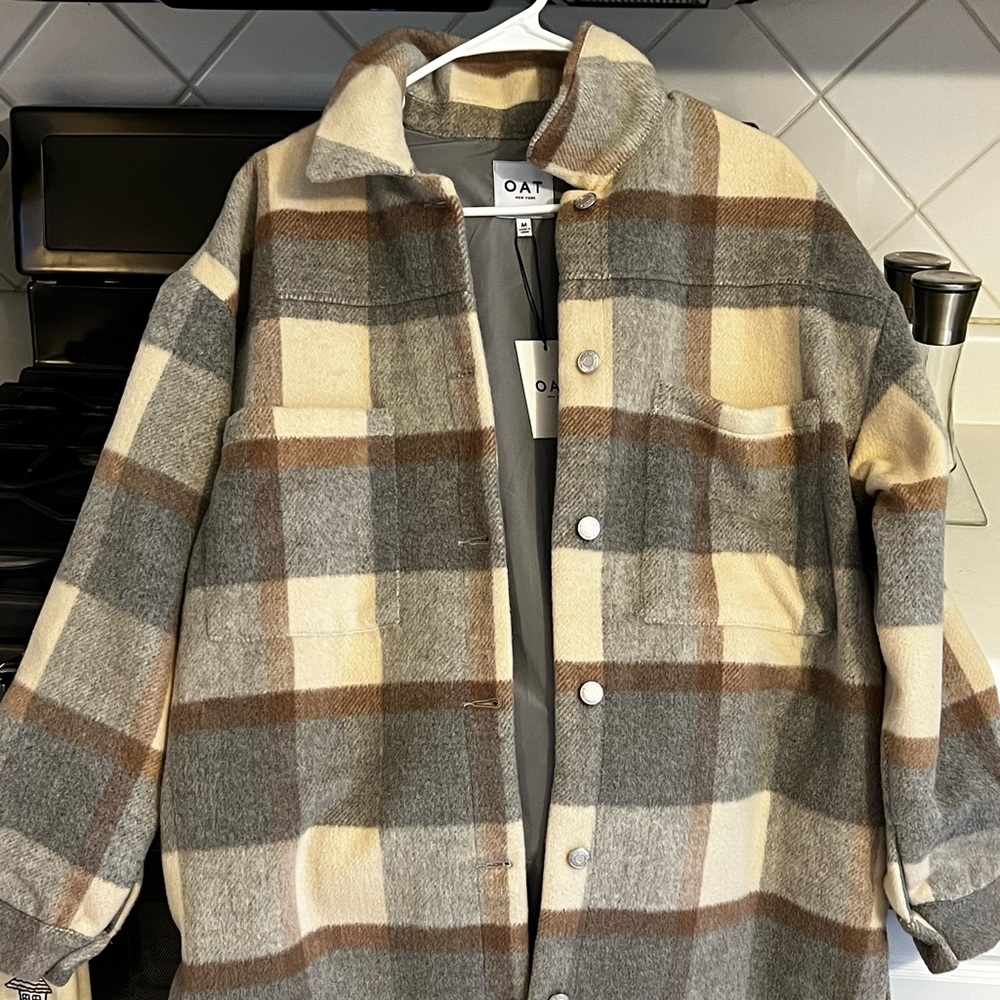 Beautiful “Shacket” shirt/jacket in tans and  grays with nice deep pockets .